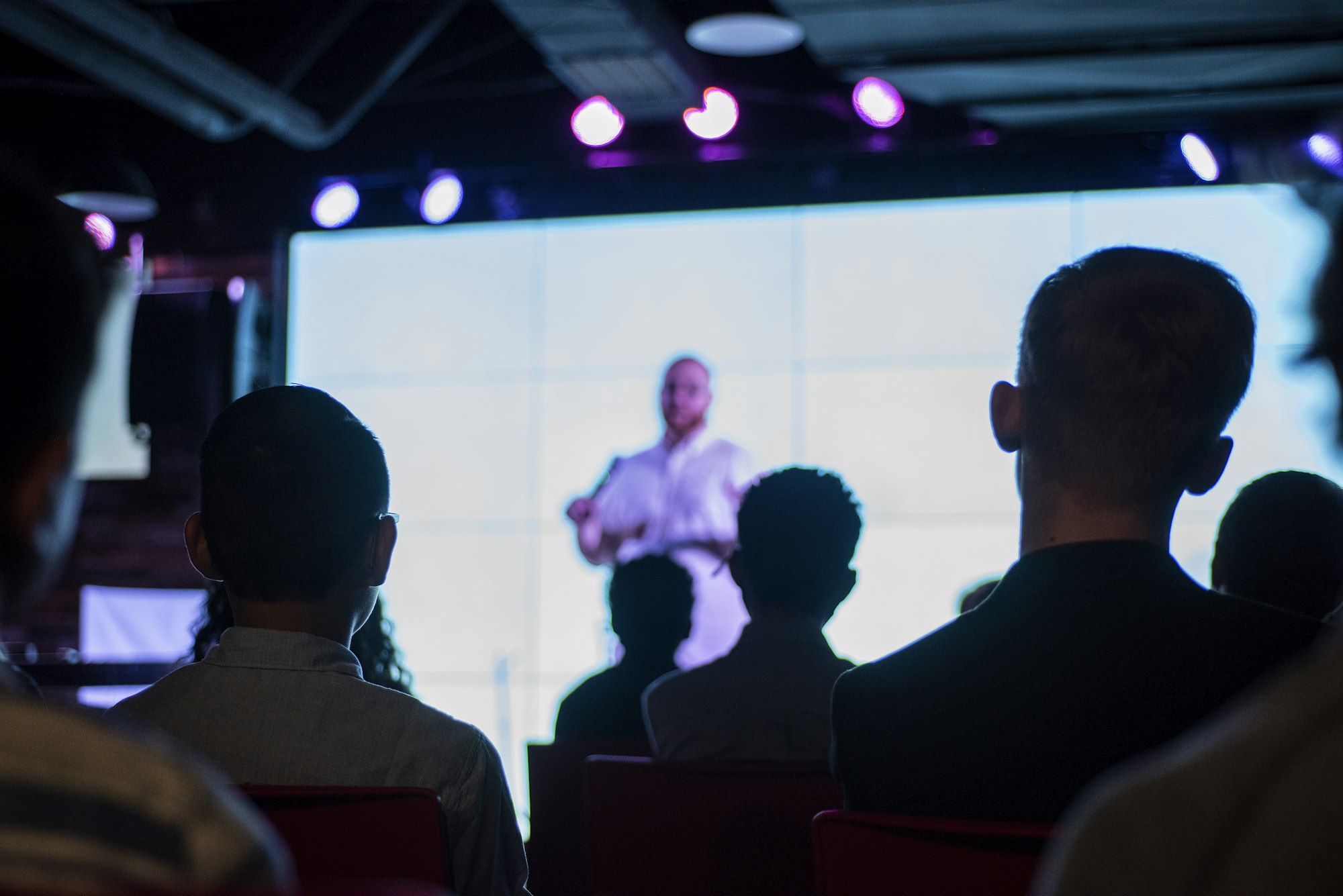 Speaker on a conference stage